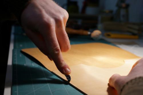 MES leather hand rolling