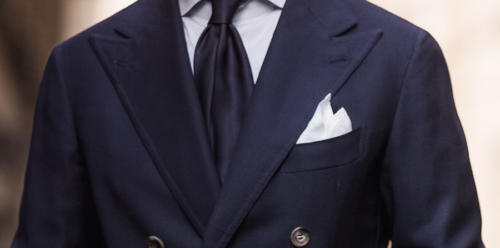 White handkerchief with navy blazer