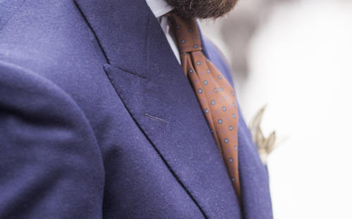 royal blue flannel and orange tie