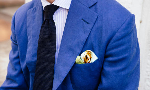 Blue linen jacket with navy grenadine tie