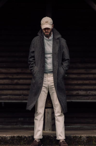 Donegal coat with white denim and cap