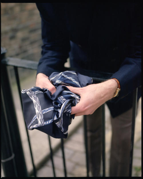 An Hermes silk scarf with all navy – Permanent Style