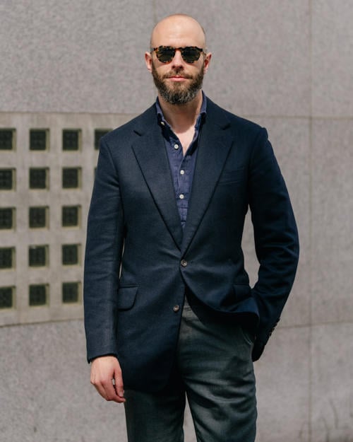 Suradam Highland But Adding interest to a navy blazer and grey trousers – Permanent Style