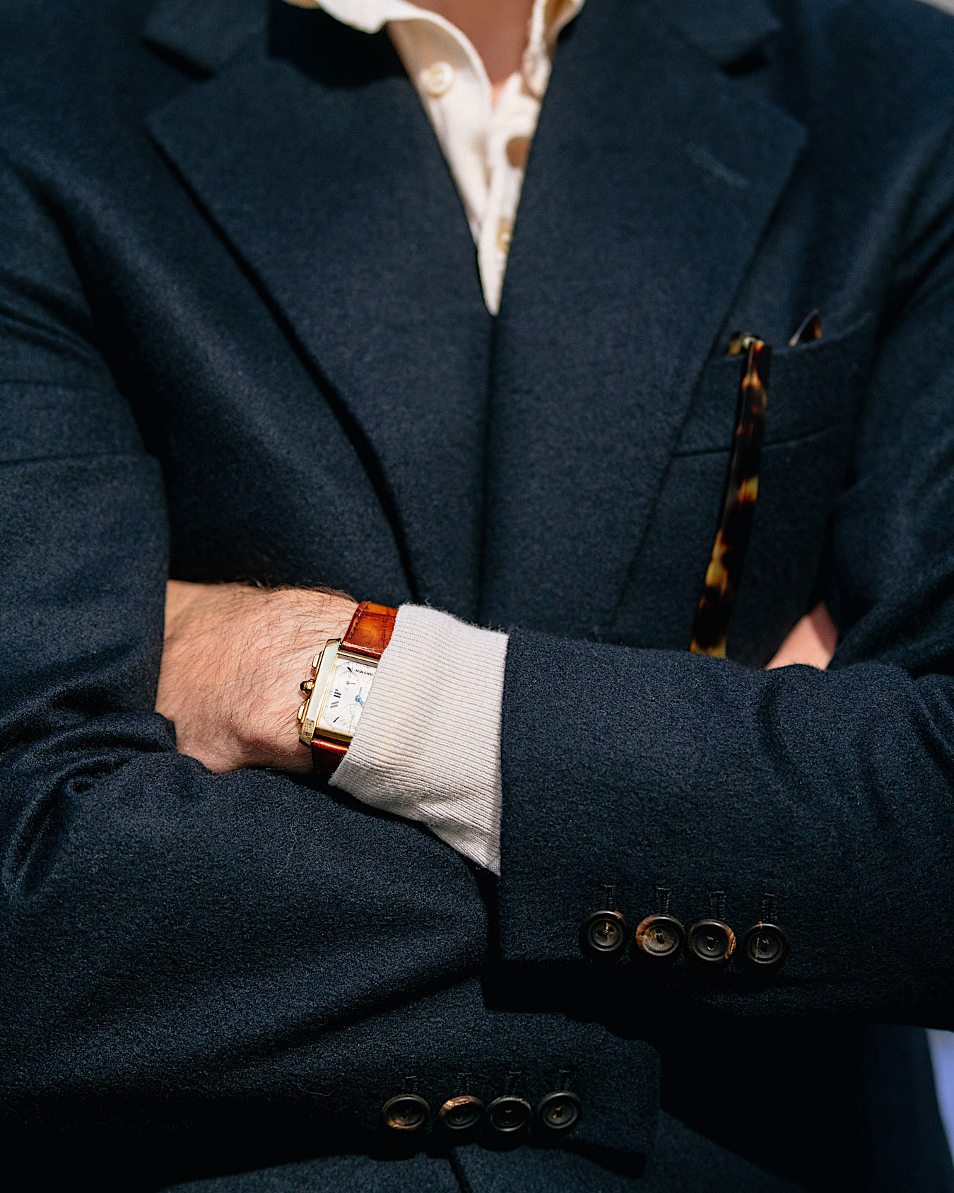 grey trousers navy jacket
