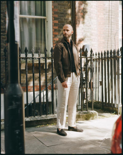 Black polo shirt with brown bomber