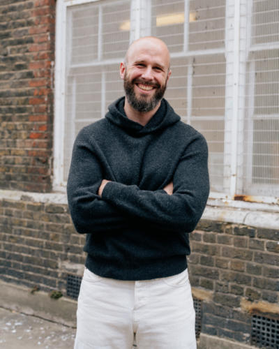 Charcoal hoodie and white jeans