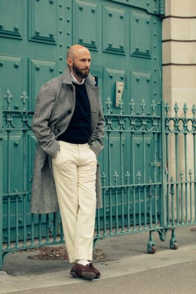 Cream trousers, navy knit, grey raglan coat