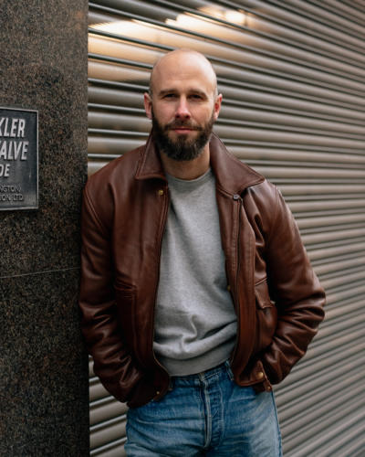 Brown leather jacket and jeans