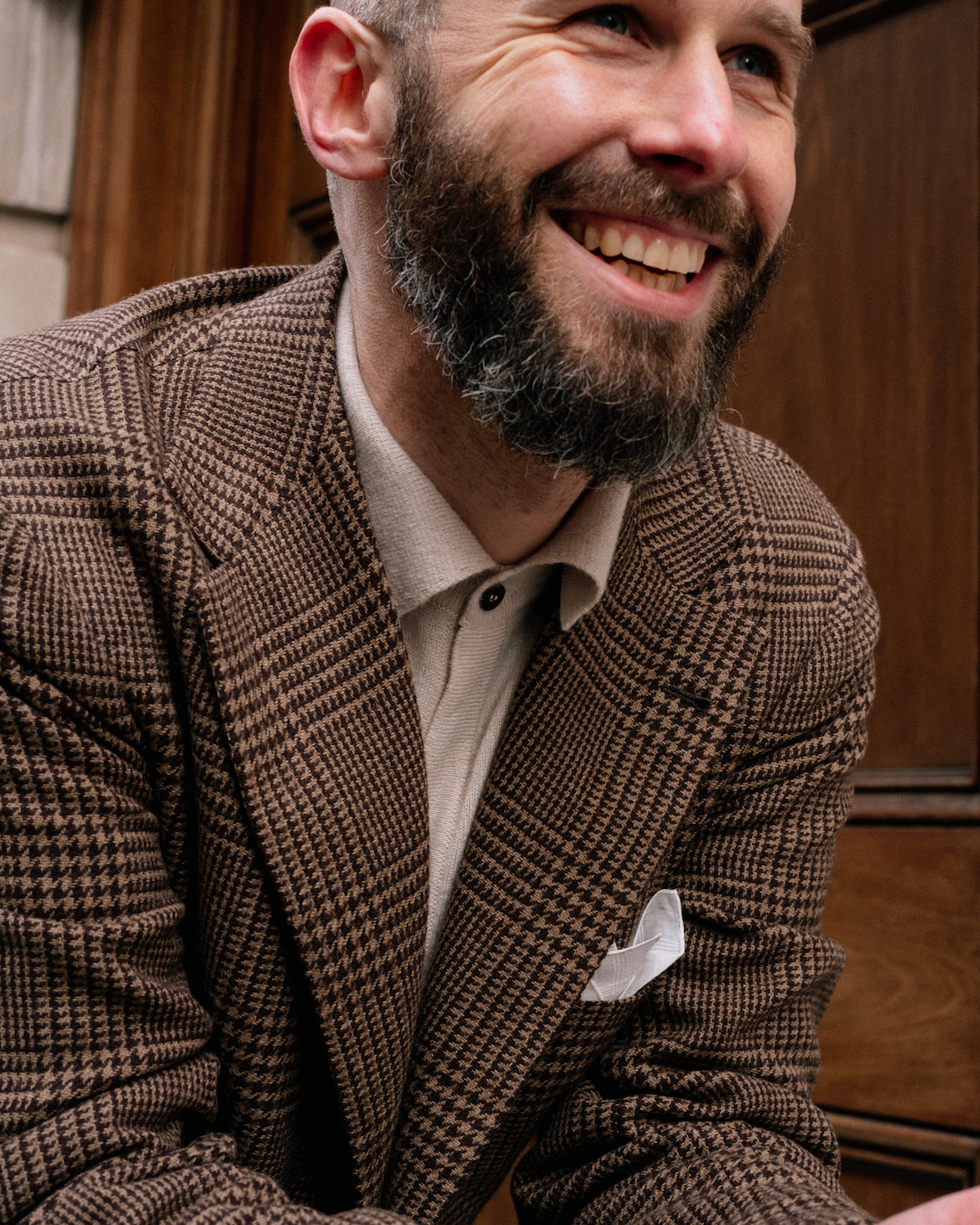 A collared cardigan under a jacket Ciardi and Colhay s