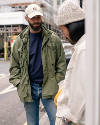 Field jacket with blue T-shirt