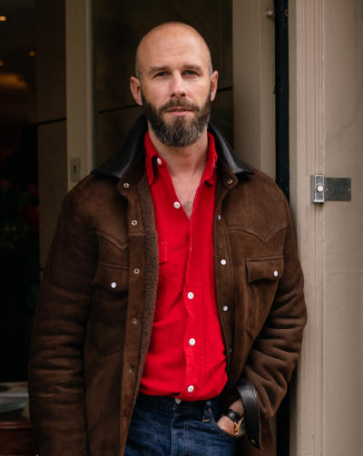 Red flannel shirt under shearling