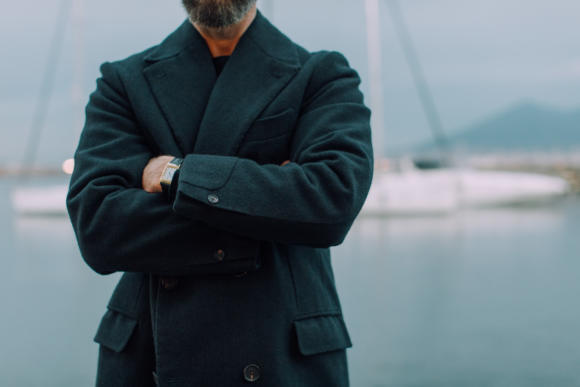 button on cuff of overcoat