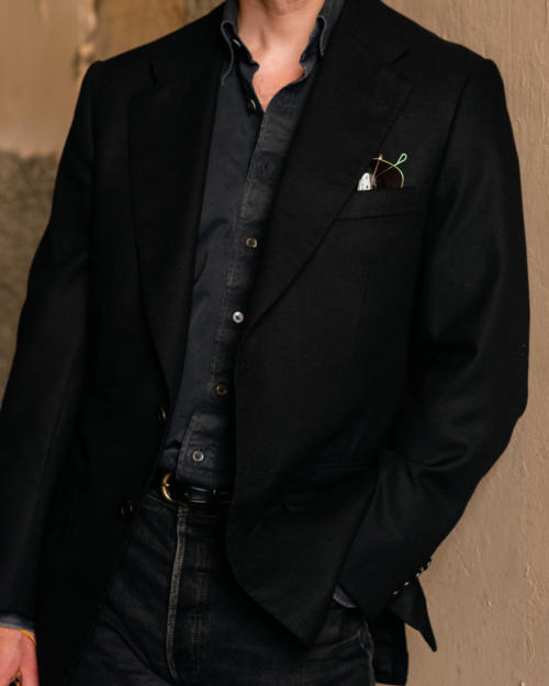 Kind of showy All black jacket and jeans Permanent Style